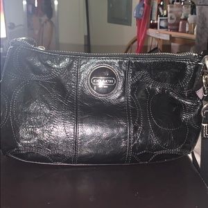 Black leather Coach Bag.